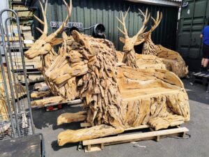 handmade teak lion bench seat made from driftwood